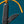 Black folding knife with a yellow rope on a blue background