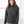 Person wearing a black hoodie with a neutral background