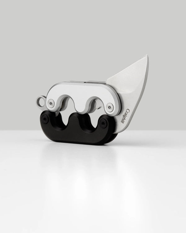 Knife with a unique handle design on a white background