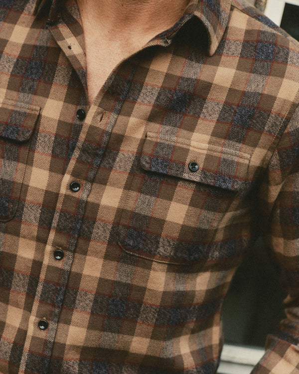 fit model showing off the pocket on The Yosemite Shirt in Buckeye Plaid