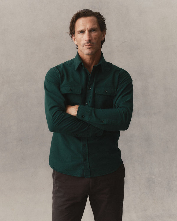 fit model showing off The Yosemite Shirt in Dark Forest
