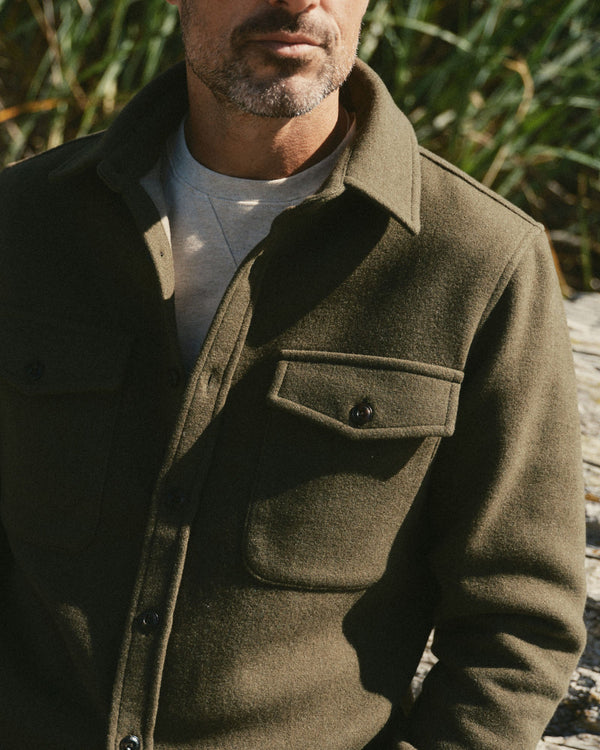 fit model showing off The Maritime Shirt Jacket in Heather Olive Wool