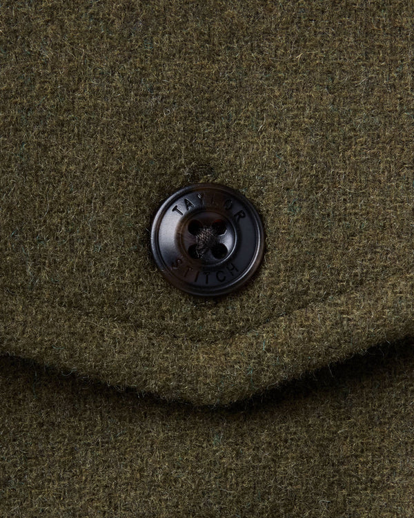 material shot of the button on The Maritime Shirt Jacket in Heather Olive Wool